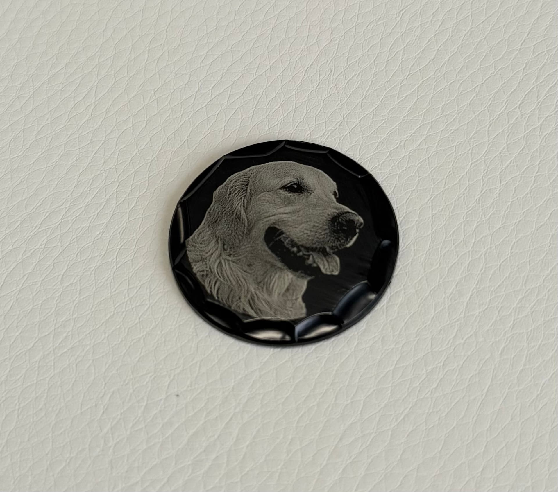 Black custom ball marker photo engraved with a golden retriever portrait