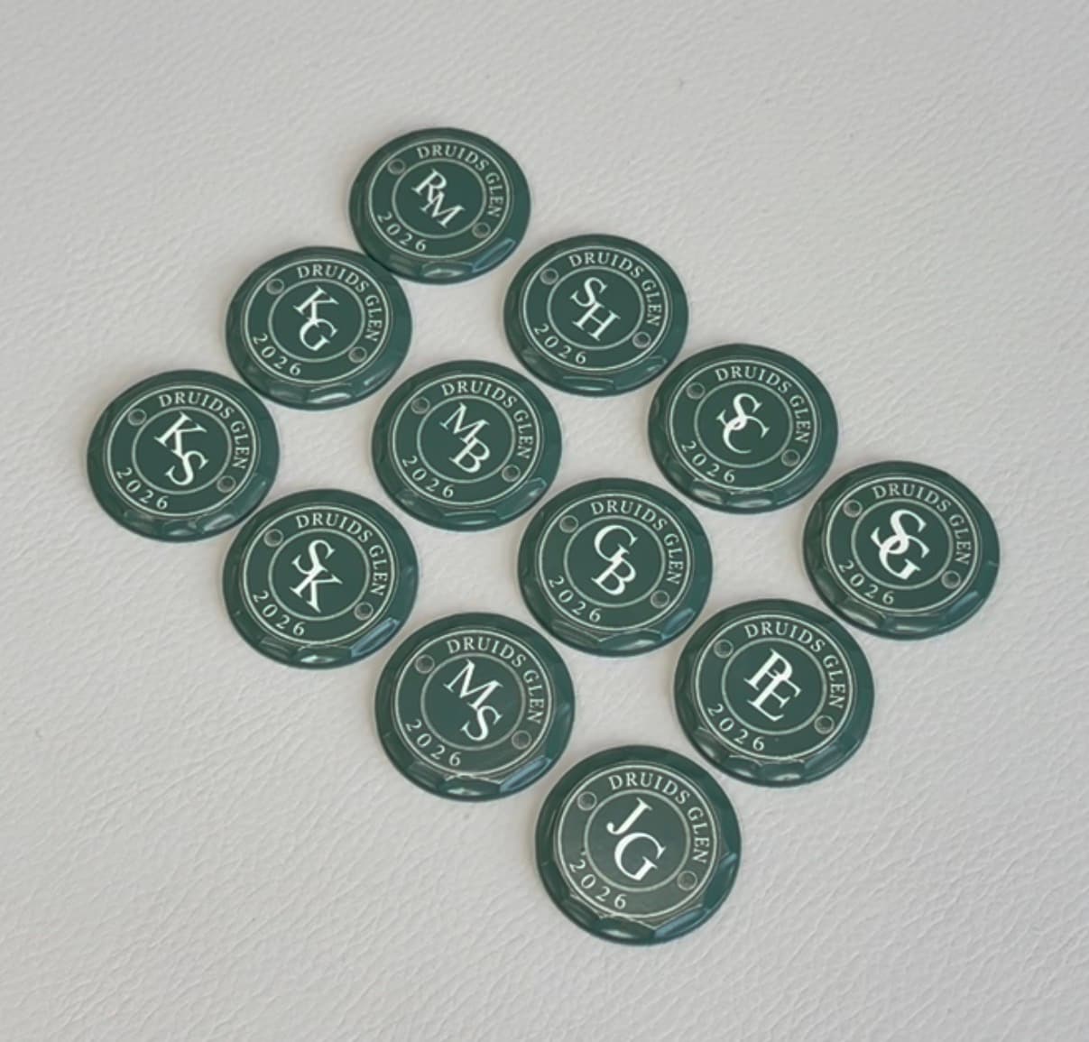 Green Druids Glen 2026 custom ball markers each engraved with personalised monogram initials