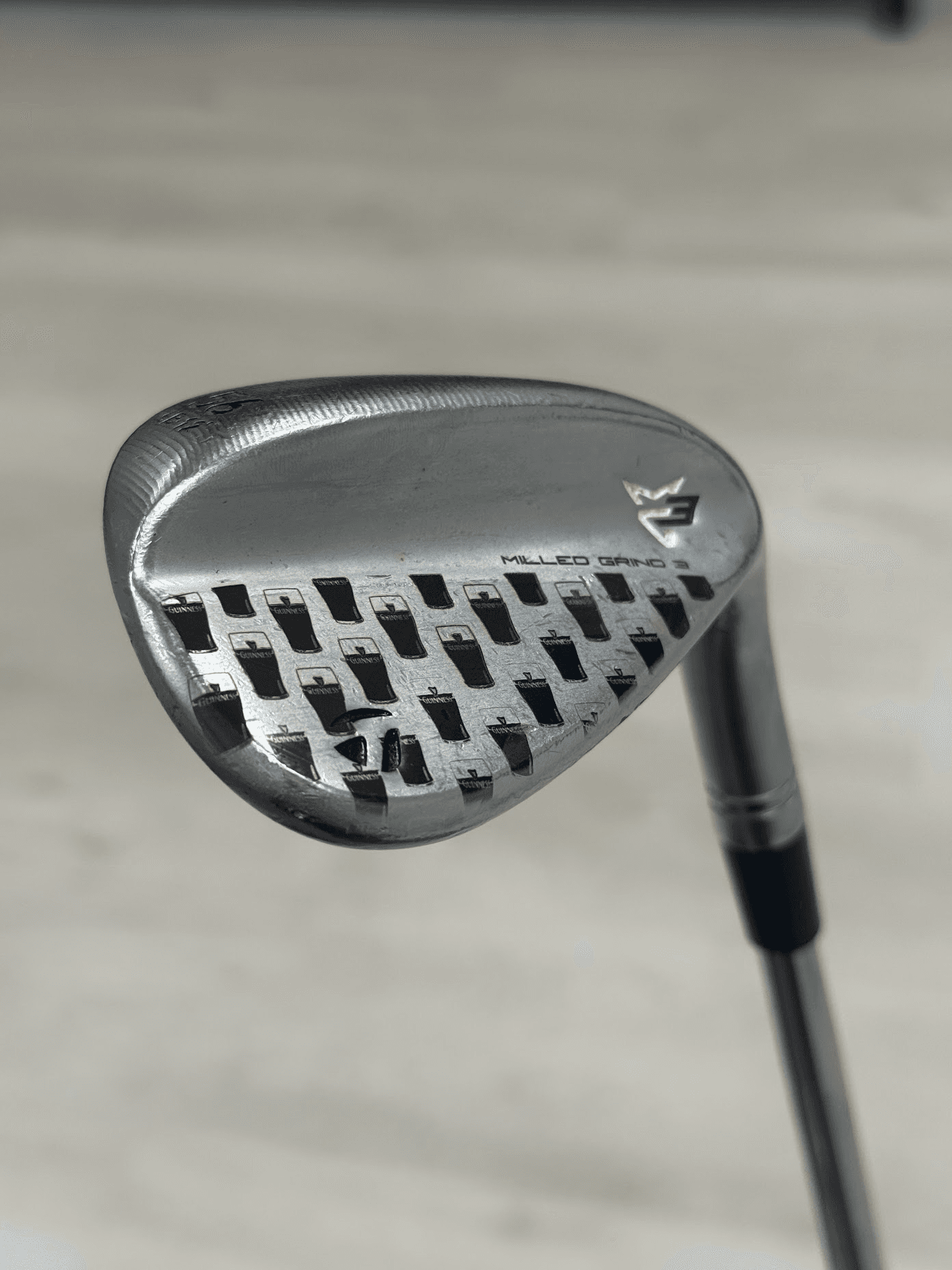 TaylorMade Milled Grind 3 wedge with Guinness glass pattern engraving