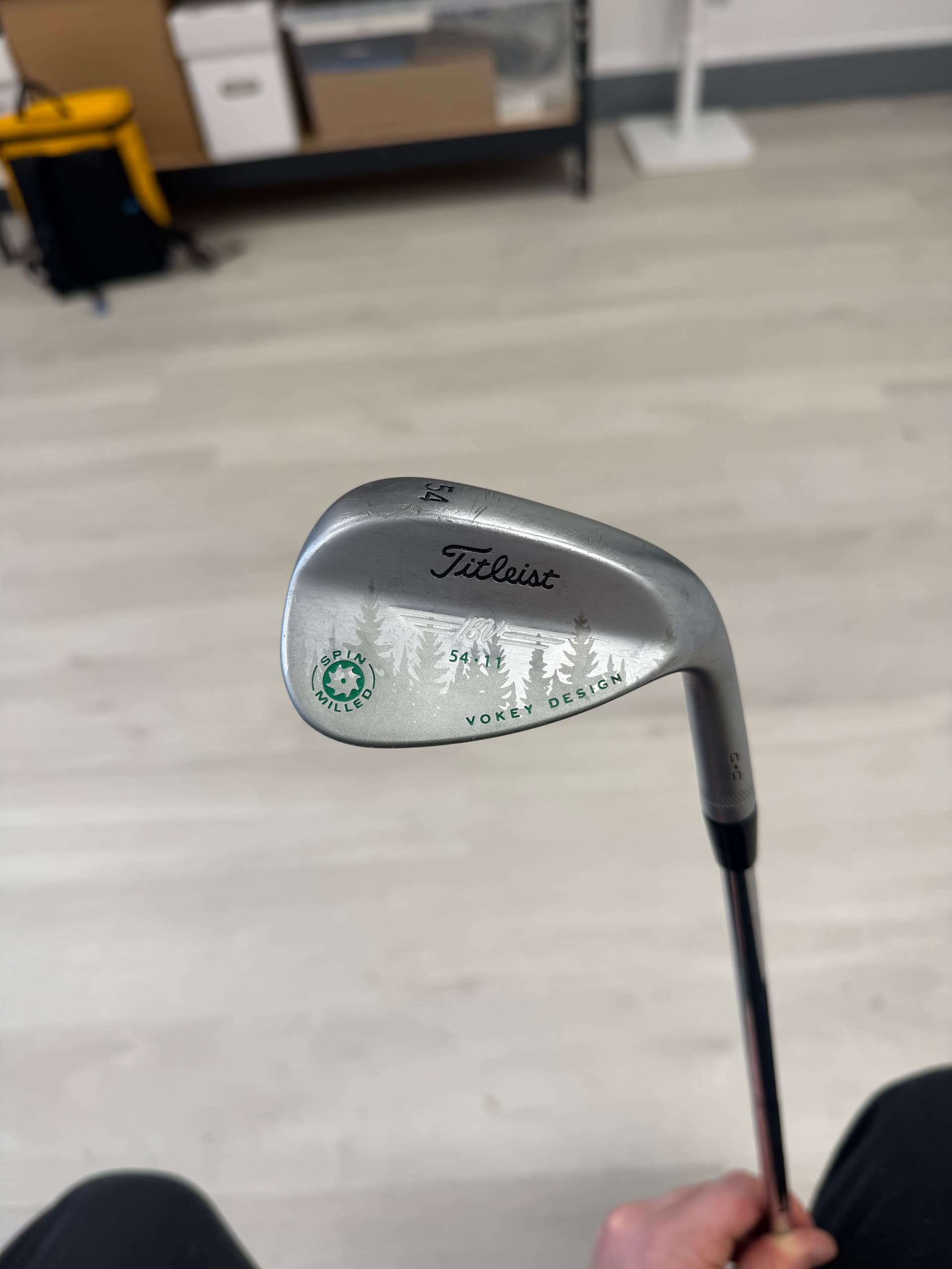 Titleist Vokey 54 wedge with forest tree silhouette engraving and green accents